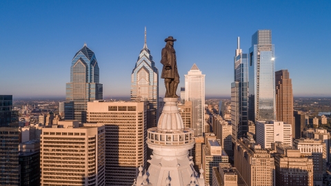 Aerial photo of the Philadelphia skyline with the William Penn statue in the foreground