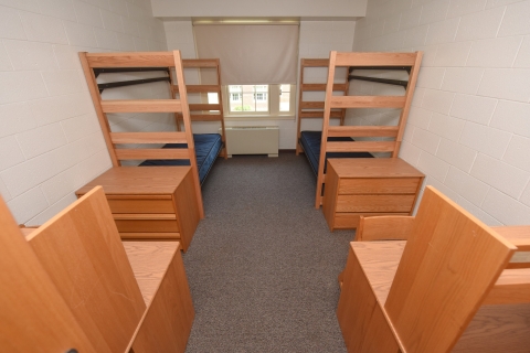 An empty two student dorm room