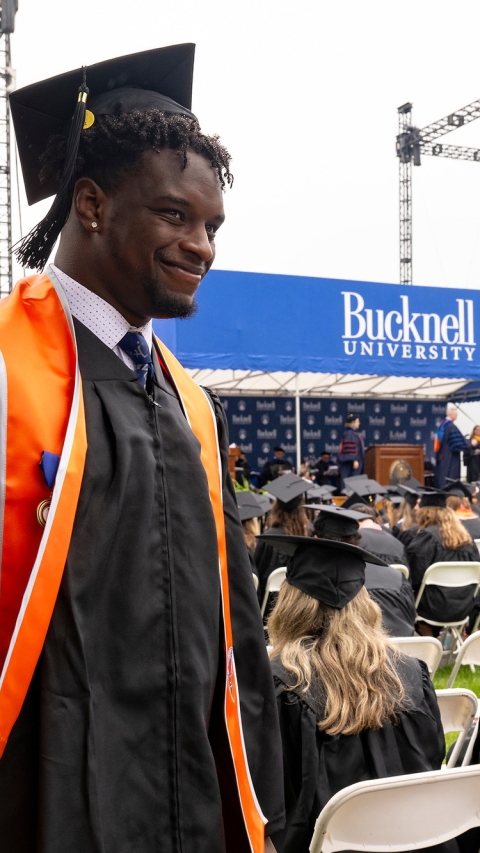 Graduates walk at Bucknell's 2024 Commencement