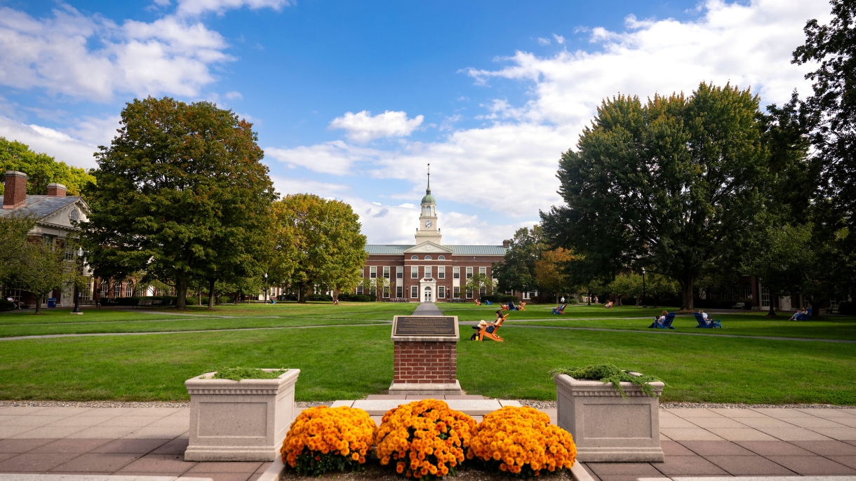 View of Malesardi Quad with dedication plaque and Bertrand Library in fall