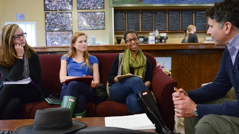 Students reviewing manuscripts