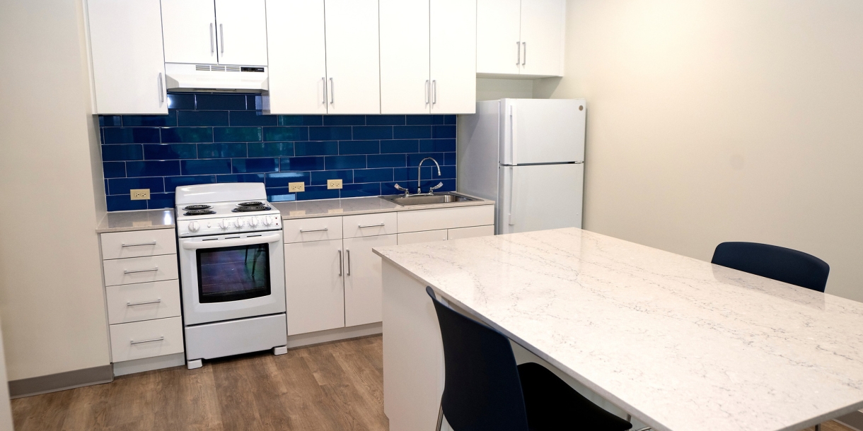 West Apartment kitchen, featuring a multifunctional island