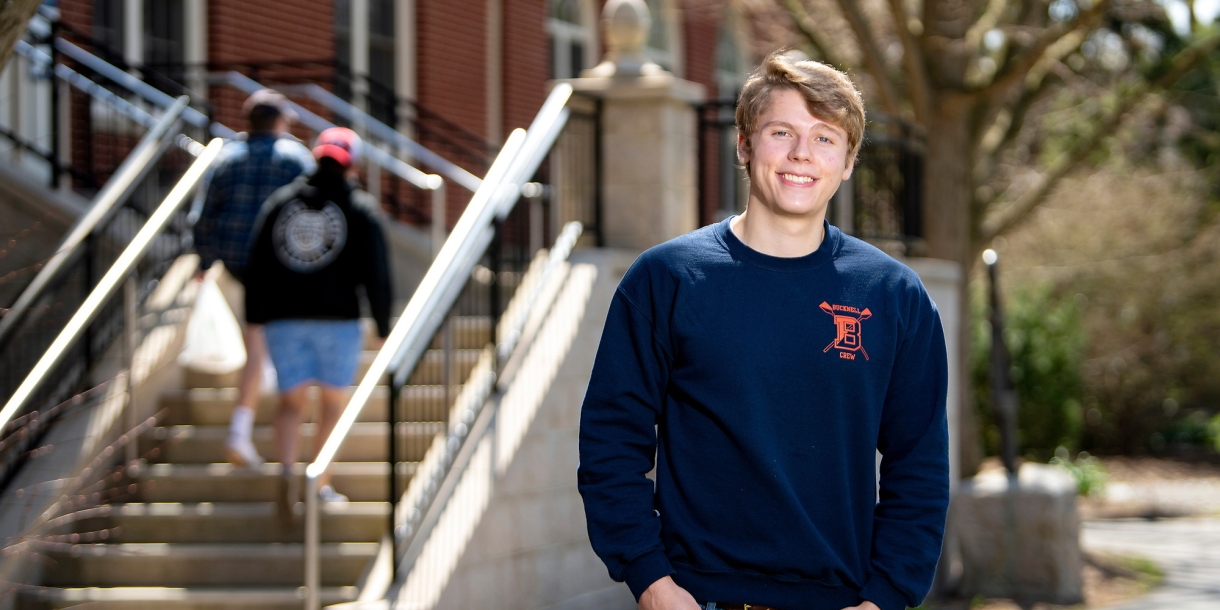 Philip Onffroy stands outside the entrance to Dana Engineering Building