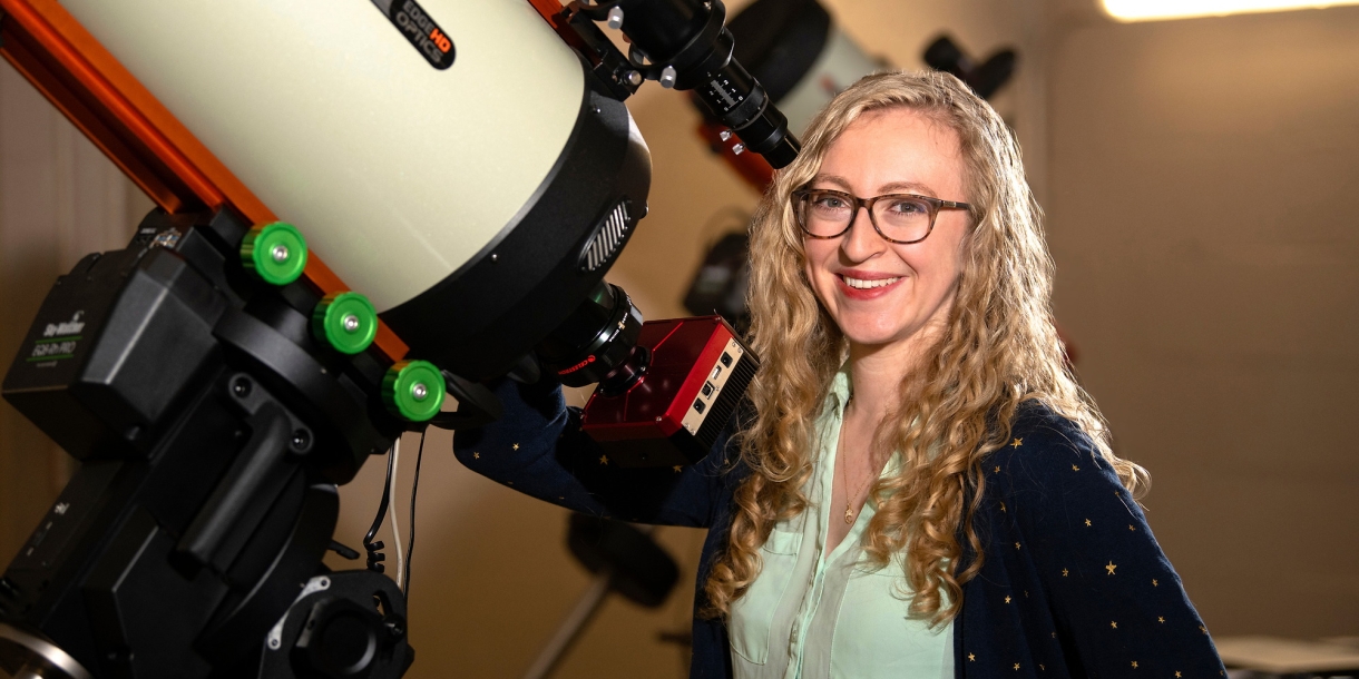 Professor Jackie Villadsen stands by a telescope in the Bucknell Observatory..JPG