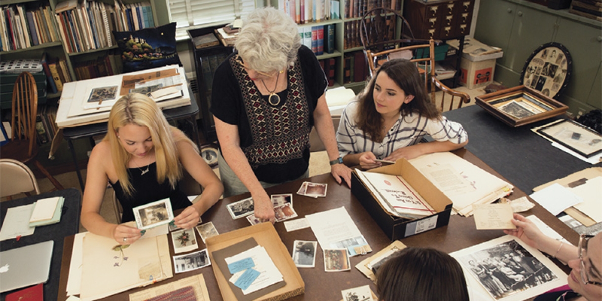 Interns sort through photos