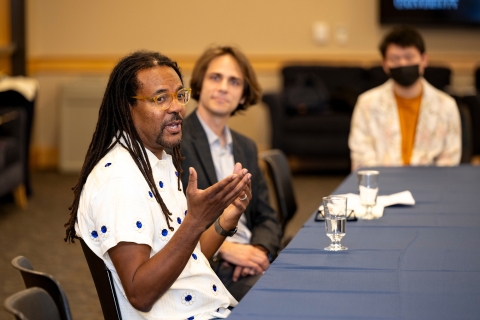 Colson Whitehead speaks to a group of students.