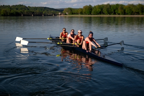 Kona Glenn &#039;25 and teammates row across the Susquehanna River in a four-person boat.
