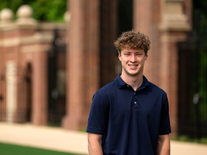 Max Wilson ’27 smiles while standing outside.