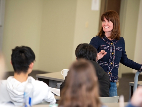 Professor Elizabeth Durden teaching class