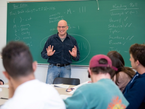 Professor Rosenburg teaches English to a class