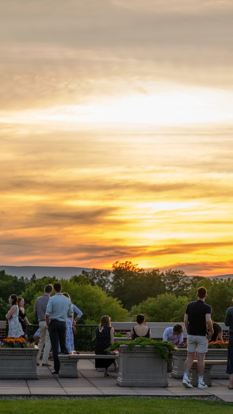 Alumni view the sunset from Malesardi Quadrangle