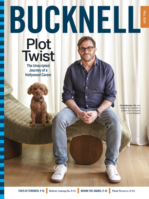 Bucknell Magazine cover featuring Chris Bender sitting on a chaise lounge chair with his mini-poodle